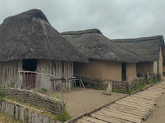 There are more huts on the right