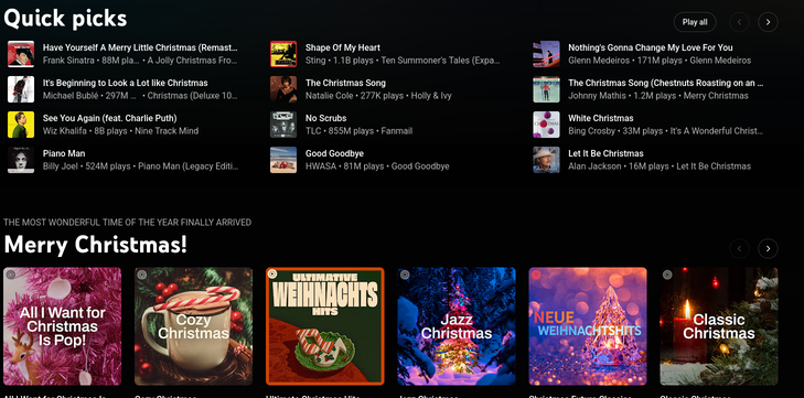 A screenshot of the YouTube Music homepage, the quick picks are full of Christmas songs, and right after that an assortment of playlists are listed for Christmas.
